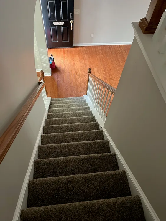Fresh, sanitized entryway and stairs after professional move-in cleaning in Cary, NC — Ever Clean House