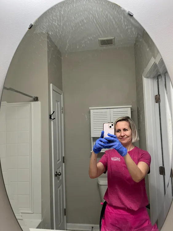 Ever Clean House cleaner finishing a bathroom detail — contact us for house cleaning in Cary, NC